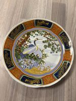 Piatto decorativo in ceramica orientale