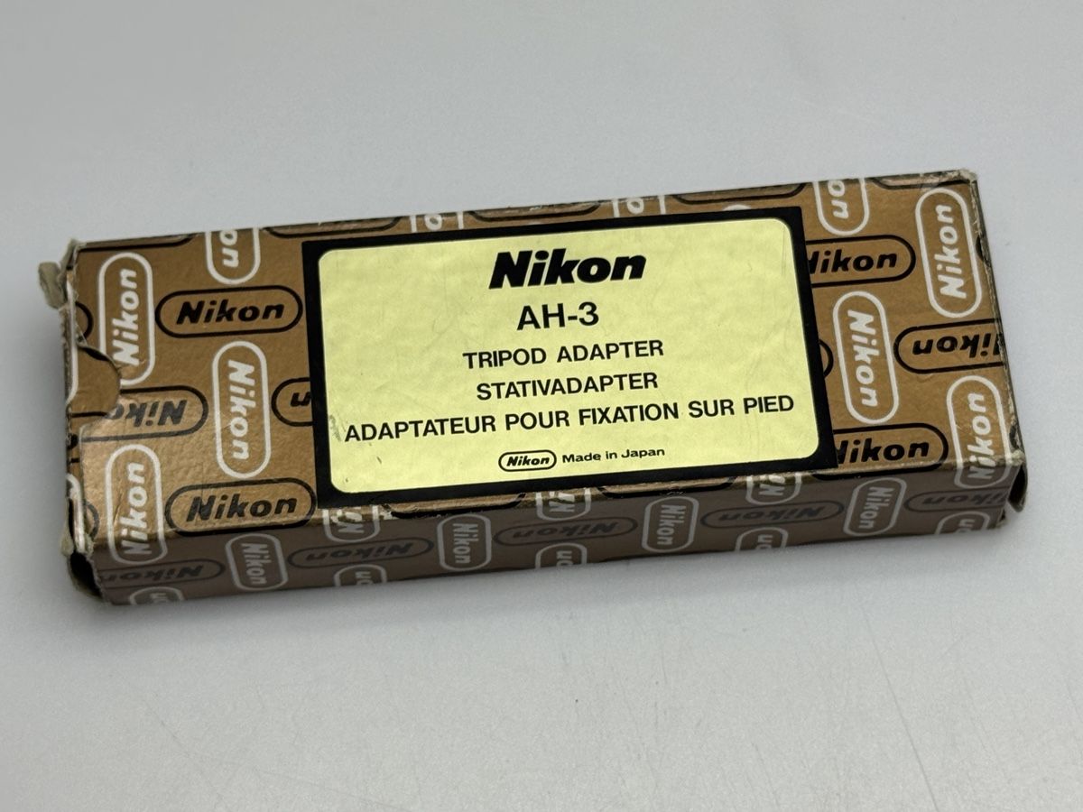 Nikon Fotocamera: Nikon AH-3 Stativadapter - Neu mit Originalverpackung – Nuovo e nell'imballaggio originale da Hägendorf venduto da Buck67