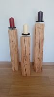 Schöne Altholzbalken mit Kerzenhalter