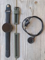 Polar Vantage M Smartwatch mit Armbändern und Ladekabel