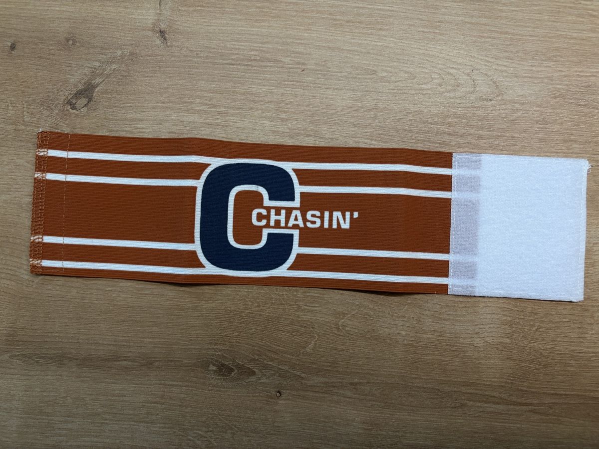 Camicie: Captain-Binde orange Chasin – Nuovo e nell'imballaggio originale da Luzern venduto da jeltic
