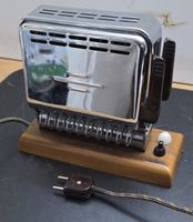 Jura Vintage Klapptoaster Chrom Holzfuss Schweizer Design