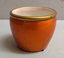 oranger Pflanzenübertopf