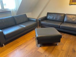 Leder Sofa Set dunkelgrau mit Hocker Ewald Schillig