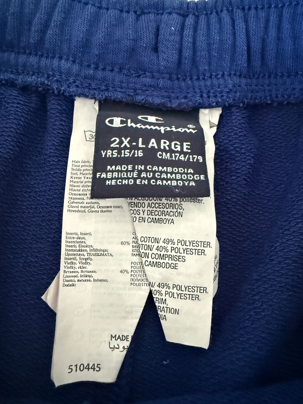 Champion Pantaloni: Champion Shorts - blau mit gelben Streifen und Logo – Usato da Hunzenschwil venduto da Reche71 1