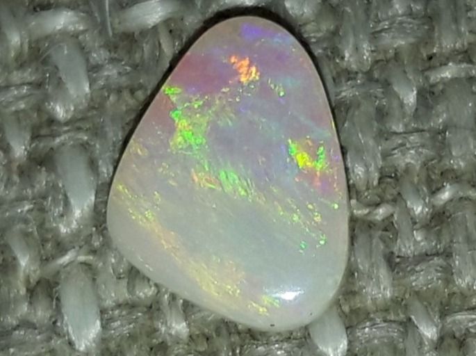 Pietre preziose: Australischer Flashfire Opal 0.47ct – Nuovo e nell'imballaggio originale da Uerkheim venduto da Winwinner 3