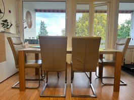Table en verre 1m80 - 8 chaises en cuir