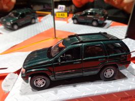Jeep Cerokee1:43 (mit Box) Maisto   > (A2)