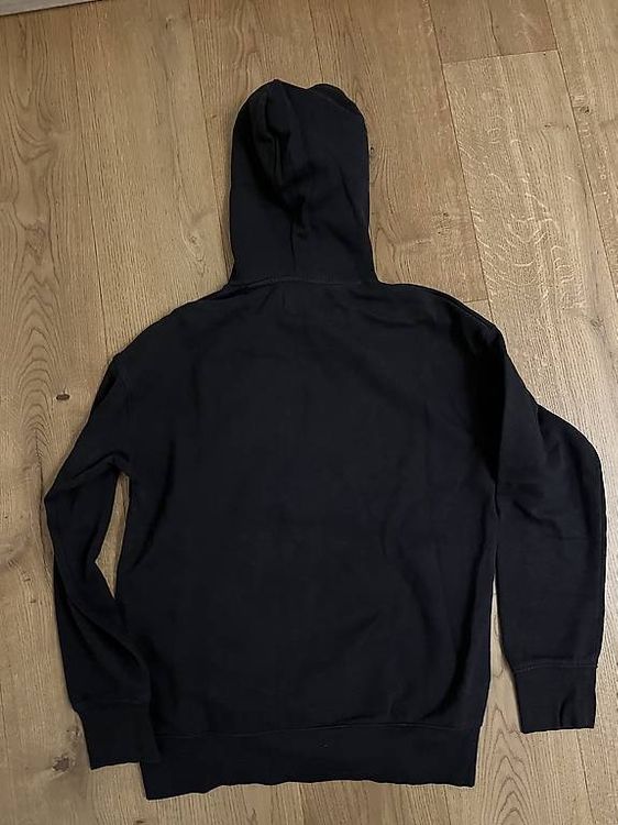 Black hoddie with a smile 2