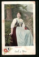 Junge Appenzellerin in Tracht mit Blumen