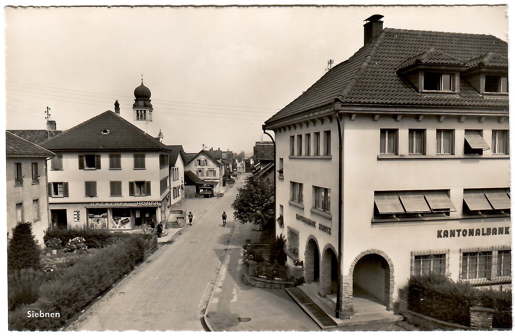 Cartoline postali: Ansichtskarte  Siebnen, Bahnhofstrasse – Usato da Kerns venduto da etma3