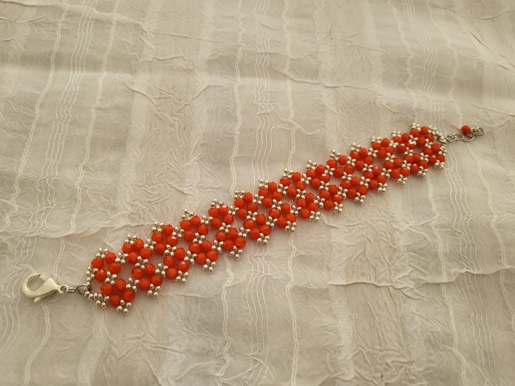 Bracciali & Braccialetti: Handgemachte armkette aus glasperlen dunkelorange – Usato da Dietikon venduto da Eleda