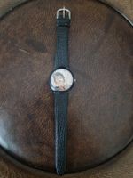 Uhr mit Clown Zifferblatt