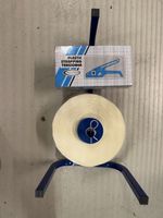 Tendeur de cerclage plastique avec dérouleur et bande neuve