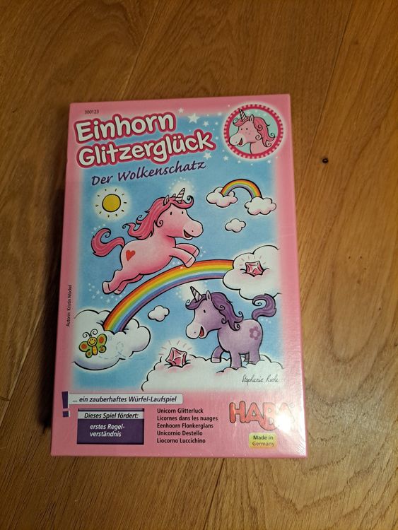 HABA Einhorn Glitzerglück – Kooperatives Lauf- und Sammelspiel für 2-4 Spieler ab 4 Jahren – Party im Wolkenland – Brettspiel, Kinderspielzeug - 1302767001
