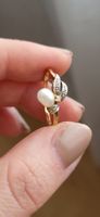 Fantastischer Perlenring mit 3 Diamanten