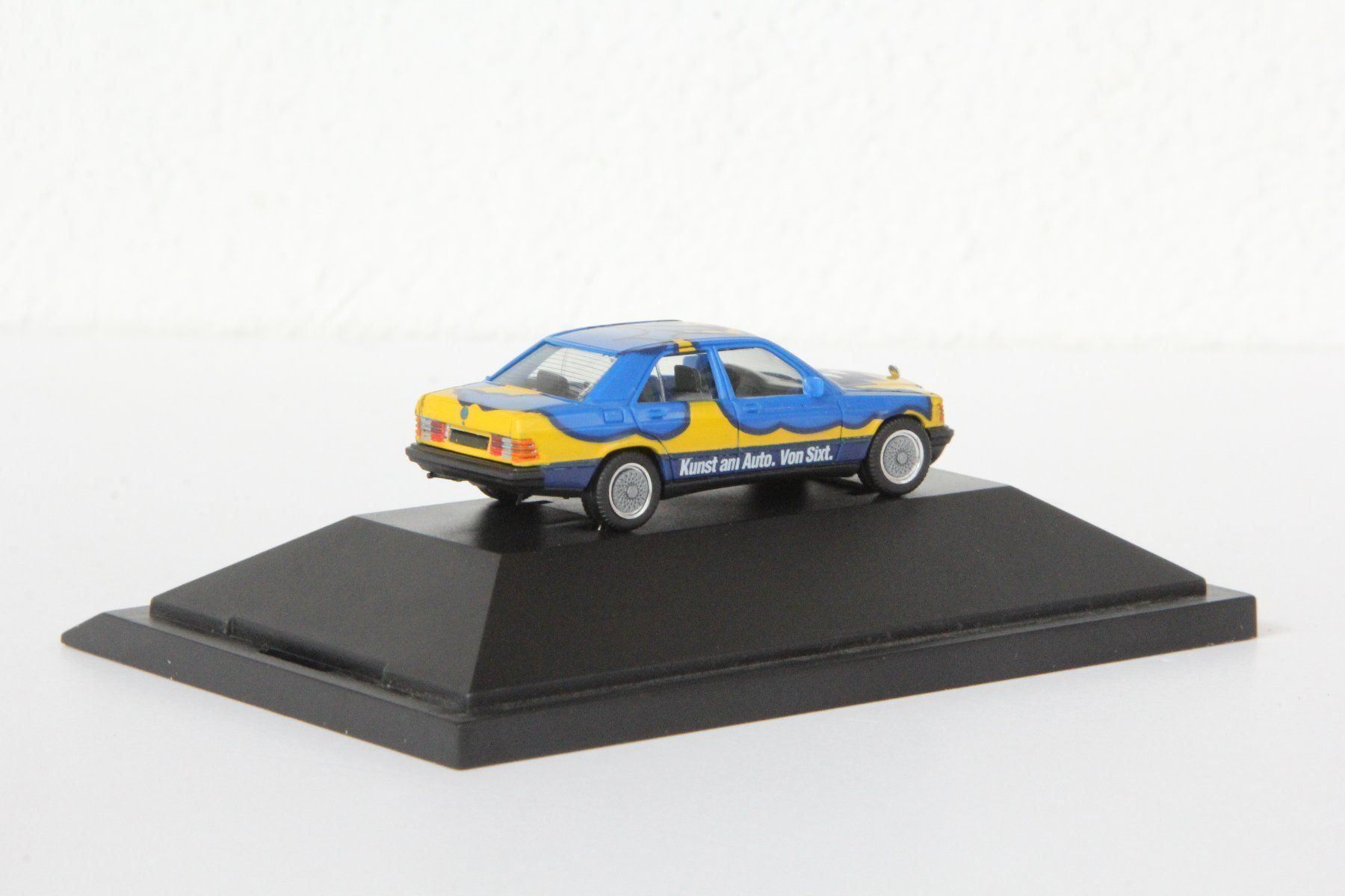 Herpa Modellautos: Mercedes 190E Sixt Art Car – Gebraucht aus Muri b. Bern von Spassholz 1