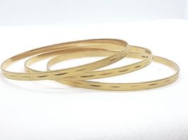 3 Armreife, 750 Gelbgold, 18 Karat Gold