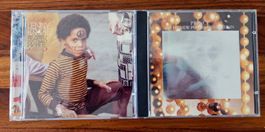 2 CDs: Prince, Lenny Kravitz