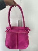 Borsa fucsia mai usata, spaziosa e in ottime condizioni!