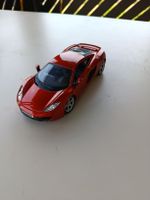 Modellauto McLaren MP4-12C orange Massstab 1:36 gebraucht
