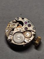 Petit mouvement Ulysse Nardin - couronne signée