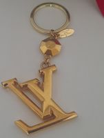 Charm,ou porte clé Louis Vuitton 