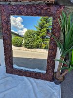 Miroir mural en bois sculpté
