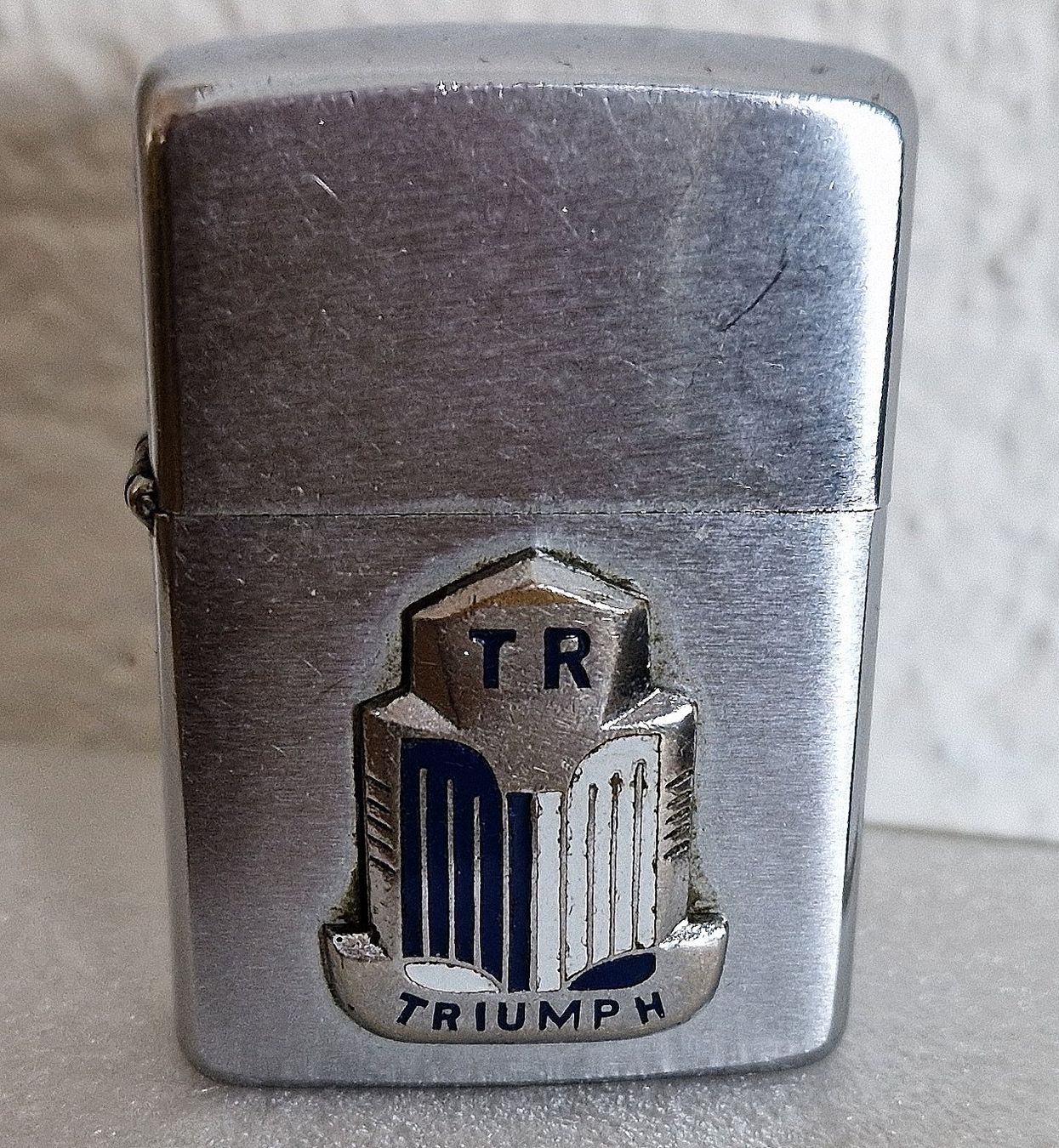 Zippo Accendini: Zippo Triumph 1950-1957 – Usato da Biel/Bienne venduto da ypslilon 1