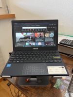 Asus e210m