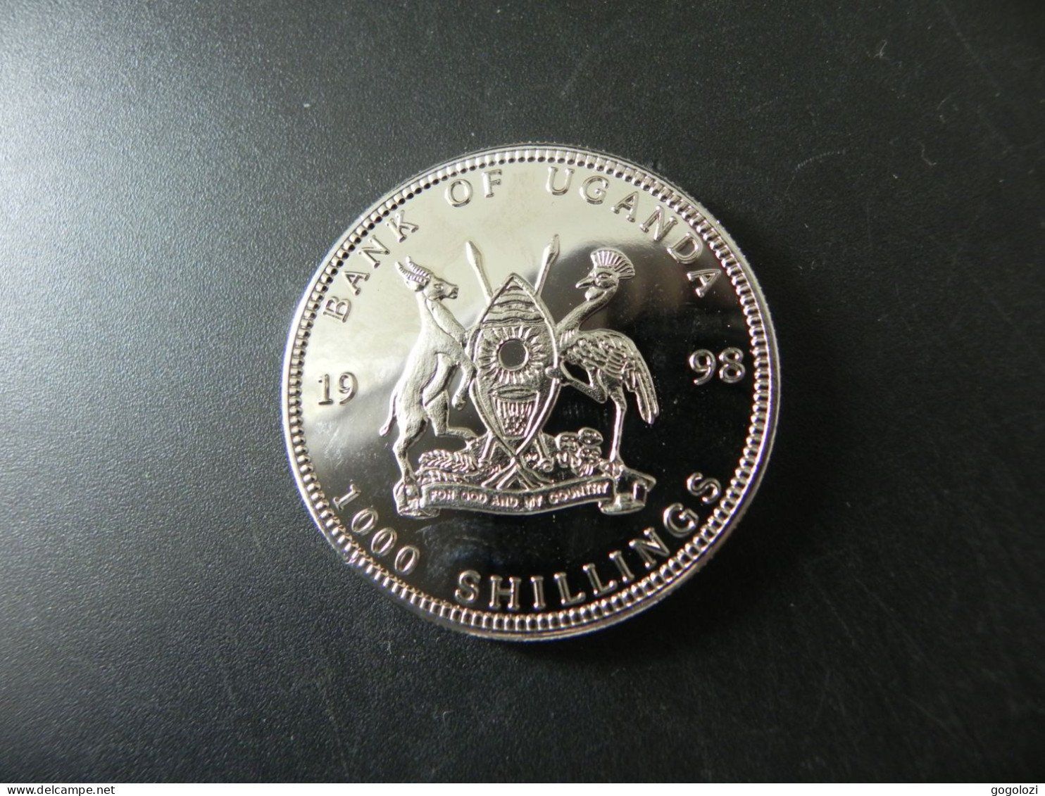 Alle Münzen: Uganda 1000 Shillings 1998 - Mönch – Gebraucht aus Biel/Bienne von Gogolozi 1