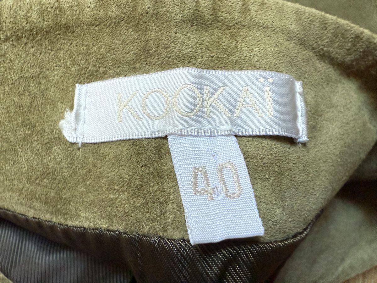 Kookai Gonne: Mini-jupe cuir velours daim vert kaki Kookai, t.40 – Usato da Tavannes venduto da Thriftshop 5