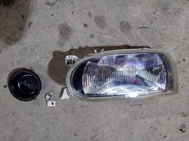 VW Golf III Scheinwerfer links - Ersatzteil, Halter defekt