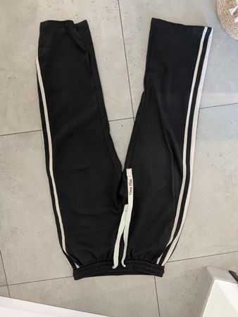 Pantalon de jogging noir avec bandes latérales bon état