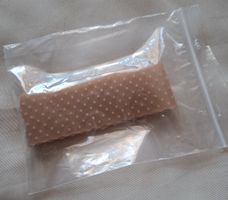 Ungebrauchtes Perückenband