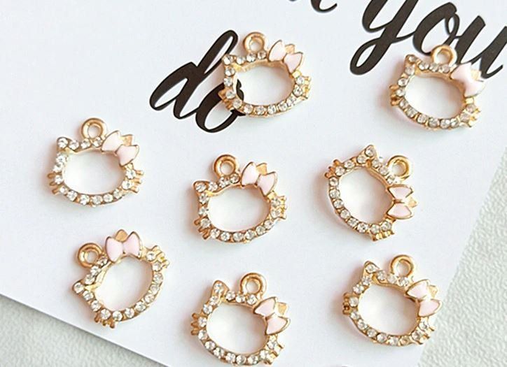 Anhänger: Hello Kitty: 2pcs pendentif doré – Neu und originalverpackt aus Lutry von kylab7
