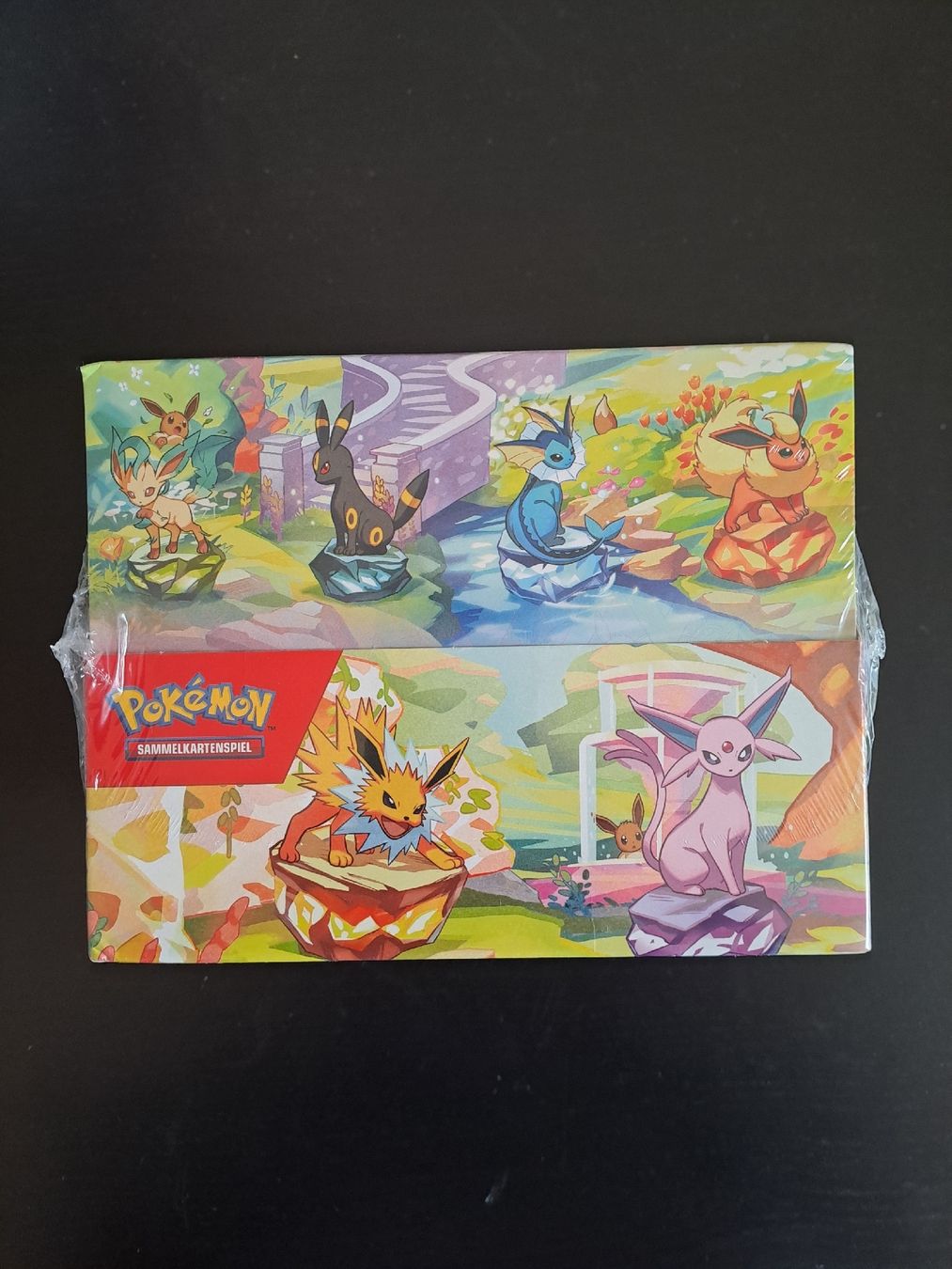 Pokémon Carte collezionabili: Prismatische Entwicklungen Mini Tin Display – Nuovo e nell'imballaggio originale da Basel venduto da mfe_86h9