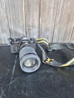 Nikon EM Spiegelreflexkamera mit Objektiv und Gurt