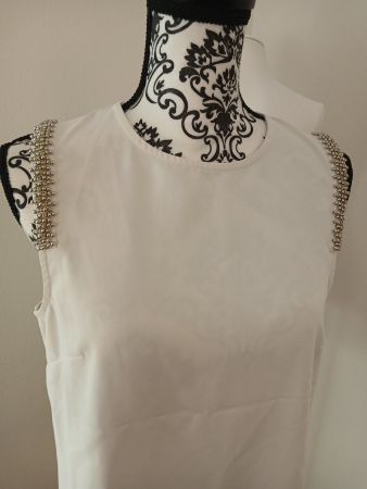 Elegantes Top mit Perlenverzierung Gr. 40