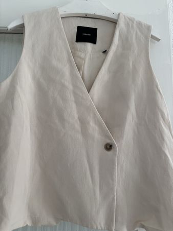 Nabril veste sans manche comme neuf 