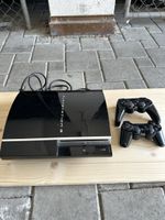 Sony PlayStation 3 Konsole mit zwei Controllern schwarz