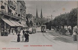 LUZERN  -  Schweizerhofquai mit Tram und Hofkirche