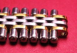 Cartier Rollen-Armband, Stahl/Gold, 16mm: Le Must 21 Lady