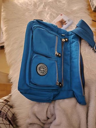 Handtasche türkis grün.