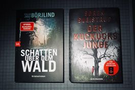 der Kuckucksjunge und Schatten über dem Wald