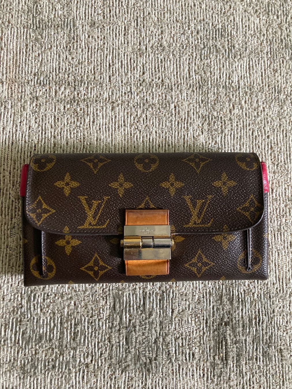 Louis Vuitton Portamonete: Louis Vuitton fuchsia monogram canvas elysee wallet – Usato da Turbenthal venduto da Seeb7