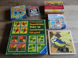 Diverse Kinderspiele und -puzzles als Set