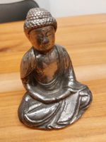 antike Buddha mit zeichen I'm Rūcken