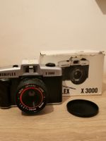 Appareil photo retro avec son carton