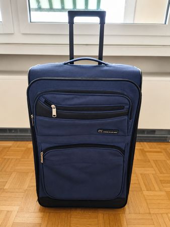Reisekoffer mit Rollen u. Griff. Dunkelblau.  Guter Zustand.